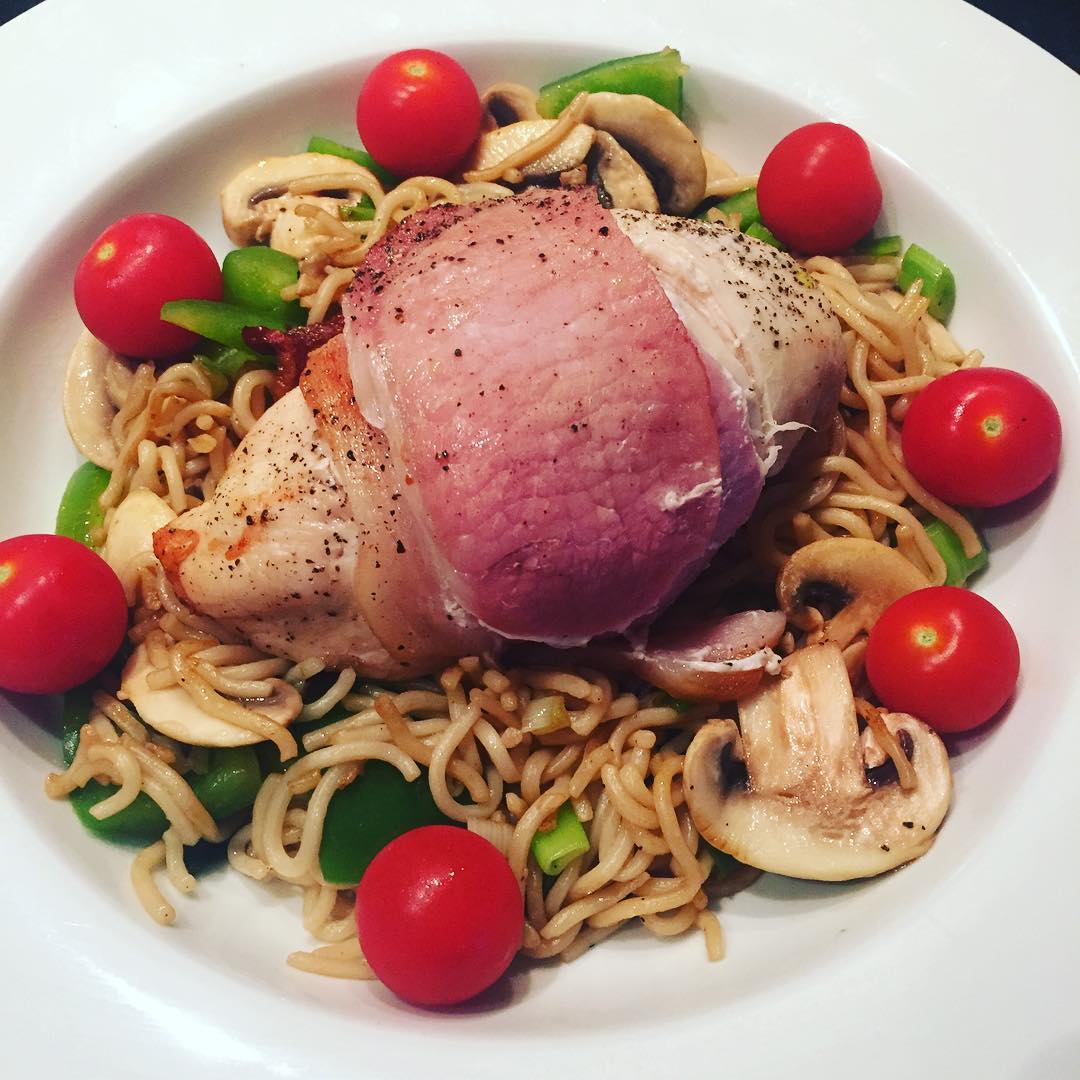 chicken-wrapped-in-bacon-medallions-served-with-whole-meal-noodles-and-mixed-vegetables